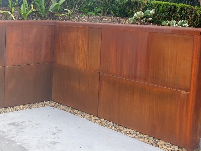 corten retaining wall 2 rows of 24' tall panels